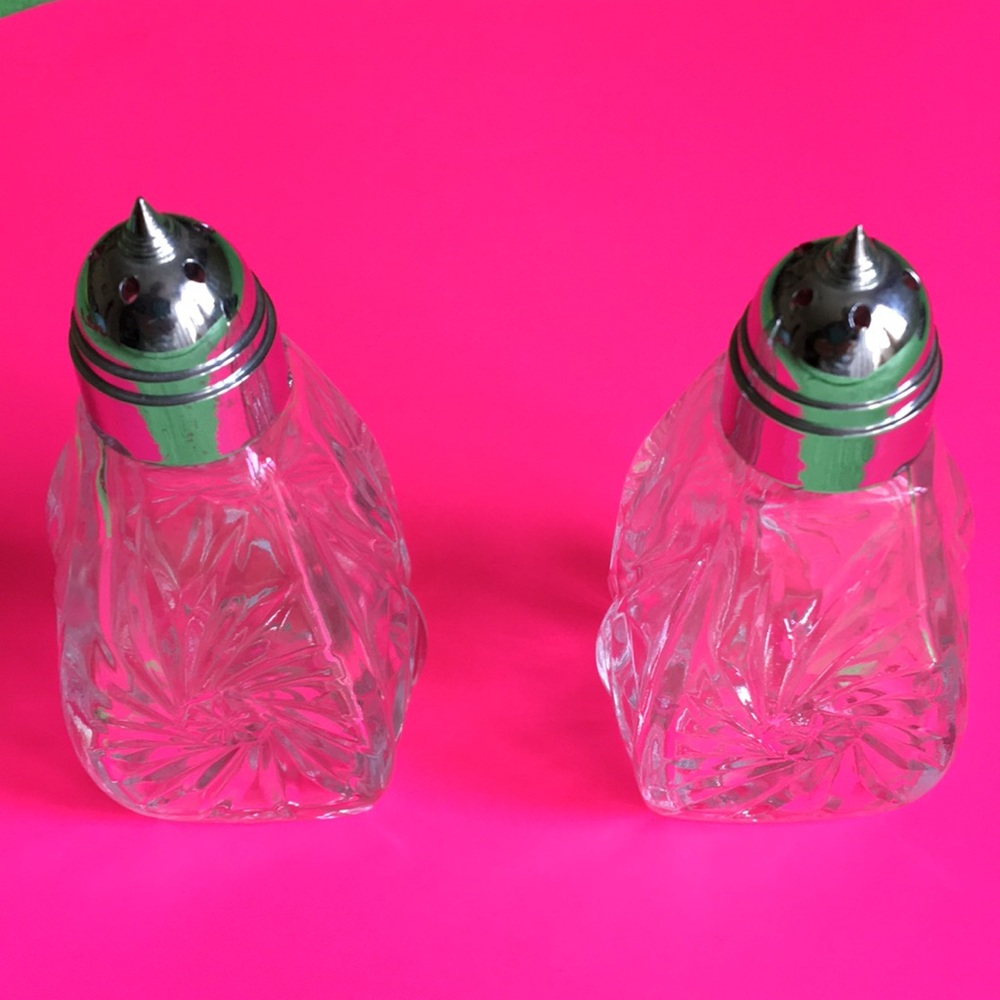 Set of glass salts and pepper shakers